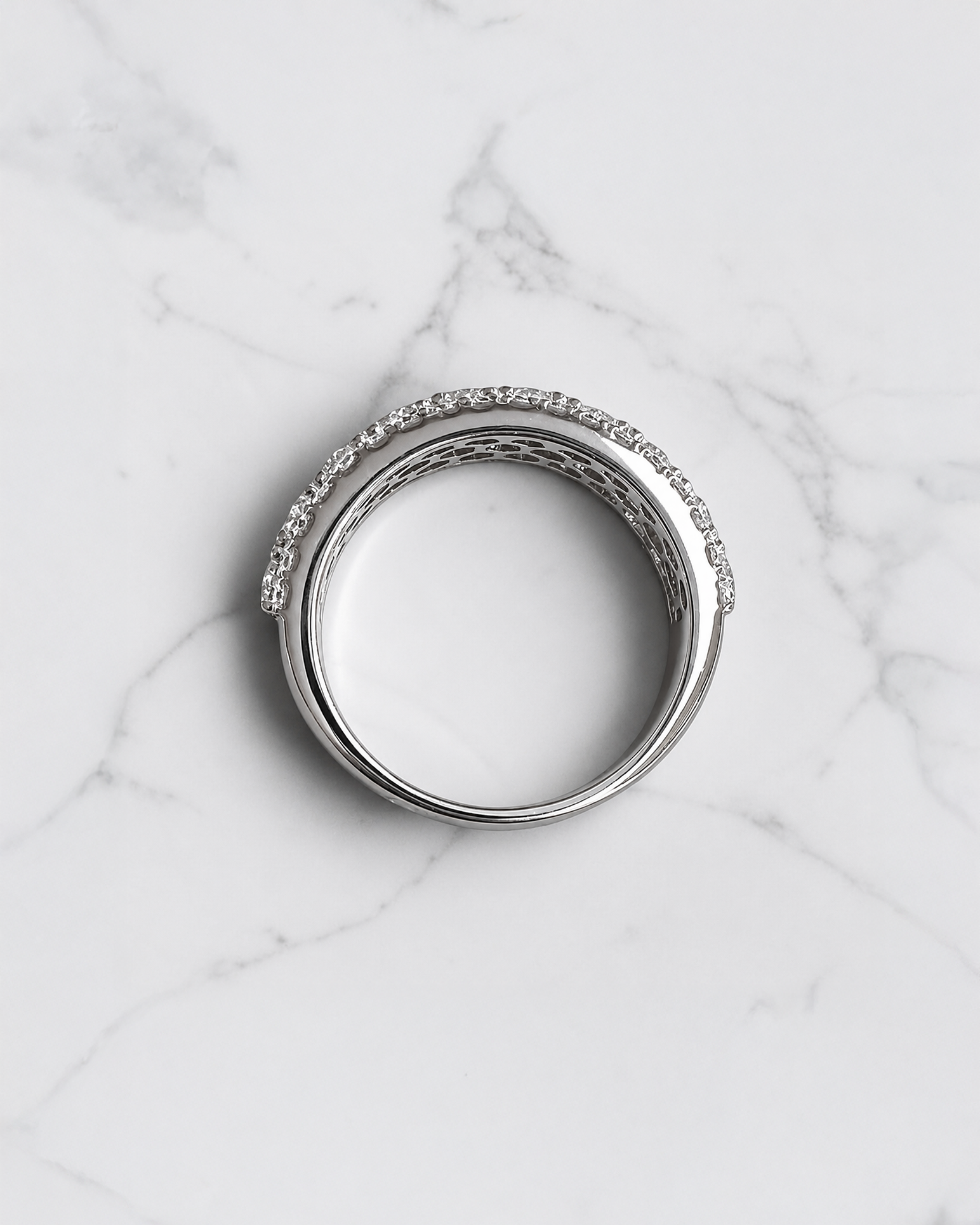 2.70ct three row round brilliant diamond band ring with graduated centre diamonds and 7.7mm wide band
Platinum or 18kt white gold