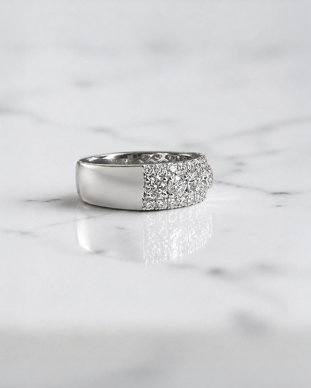 2.70ct three row round brilliant diamond band ring with graduated centre diamonds and 7.7mm wide band
Platinum or 18kt white gold