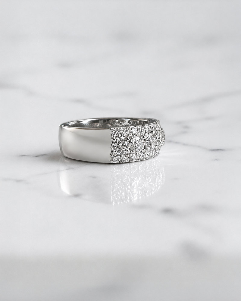 2.70ct three row round brilliant diamond band ring with graduated centre diamonds and 7.7mm wide band
Platinum or 18kt white gold