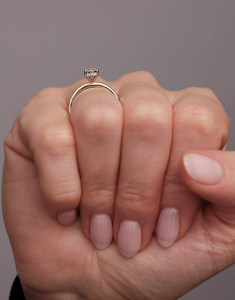 1.25ct oval cut lab grown diamond hidden halo solitaire engagement ring with platinum head by Layla Diamonds.