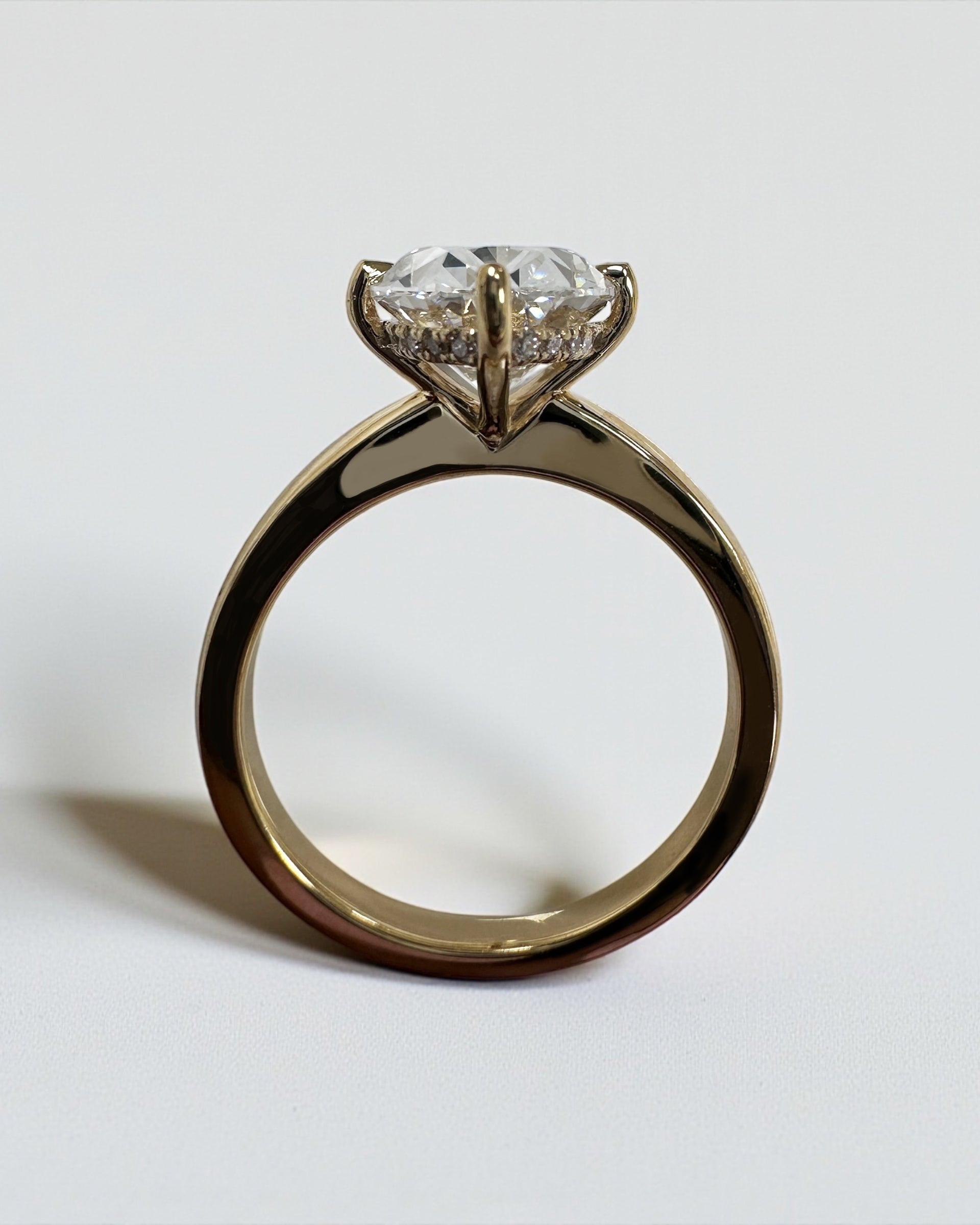 Oval 4ct lab grown diamond solitaire in compass prong setting engagement ring by Layla Diamonds London, 18kt Yellow Gold