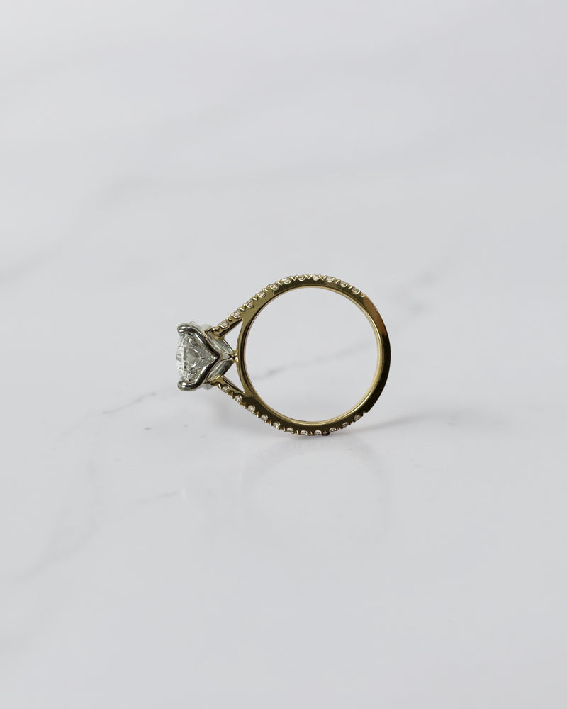 4ct oval cut lab grown diamond engagement ring with lotus head setting and diamond shoulders in yellow gold with platinum head made in London, Layla Diamonds