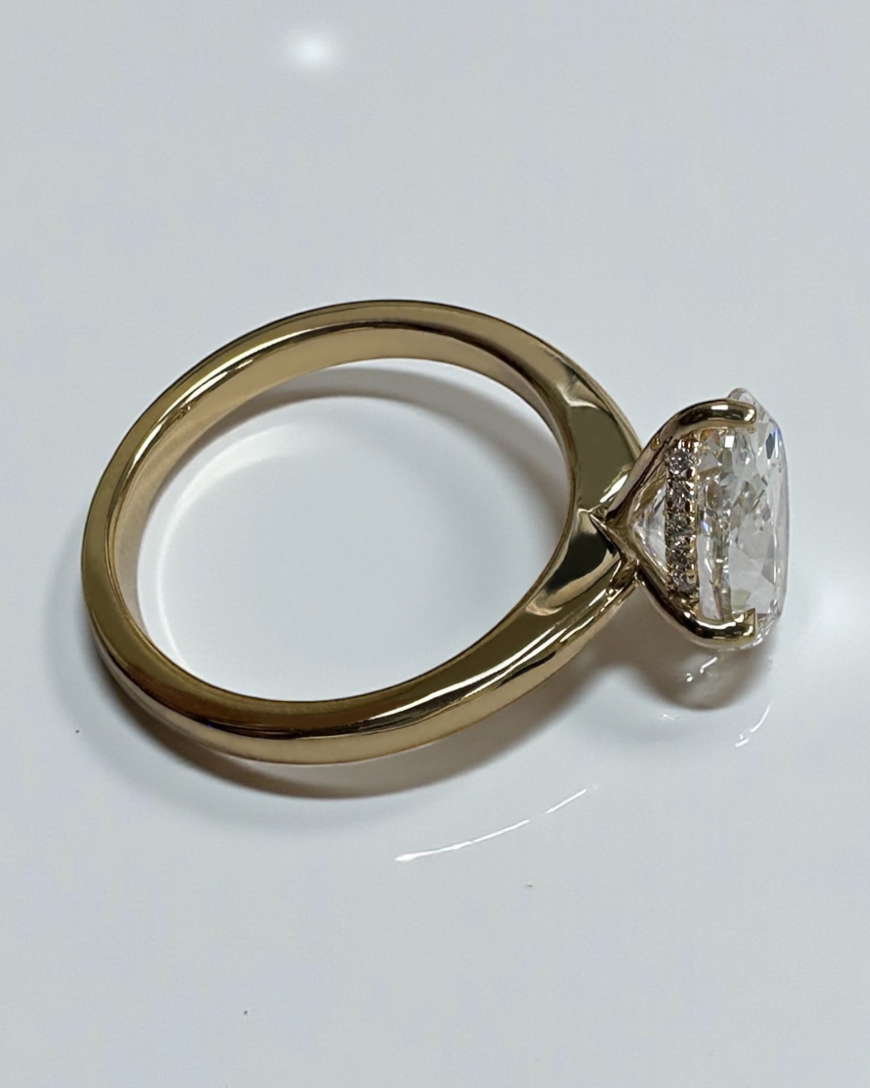 Oval 4ct lab grown diamond solitaire in compass prong setting engagement ring by Layla Diamonds London, 18kt Yellow Gold