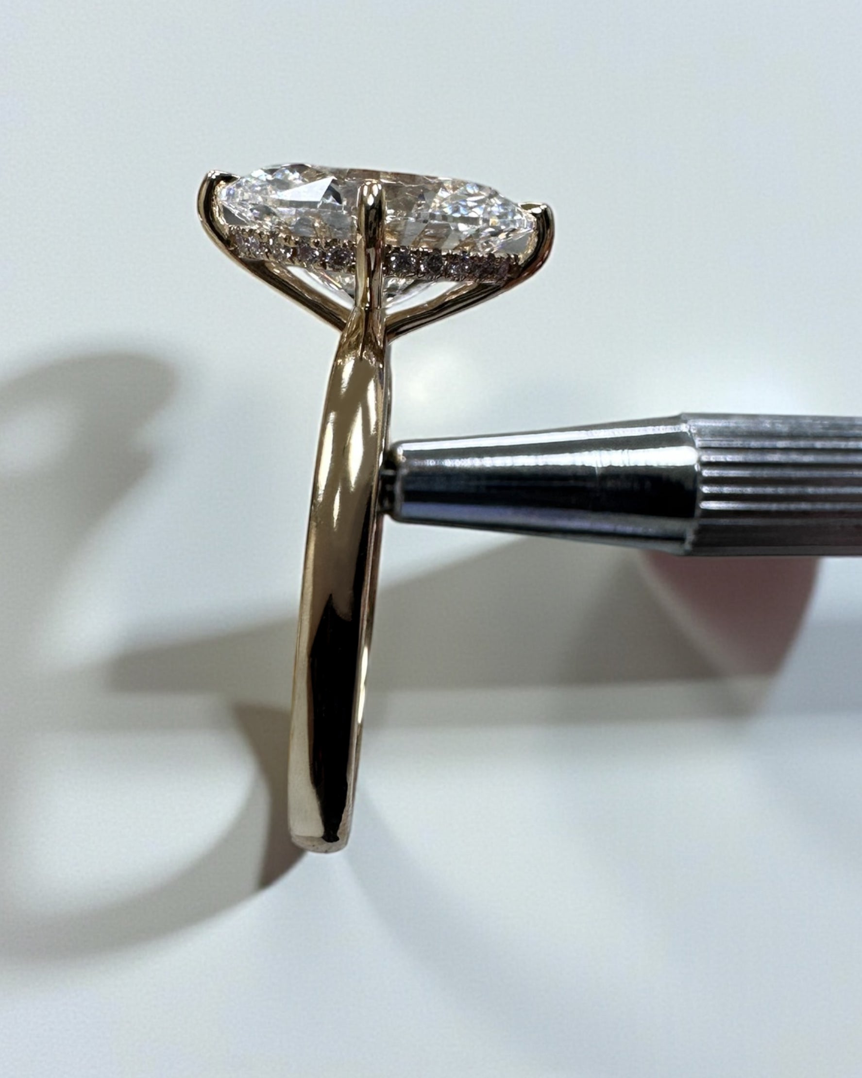 Oval 4ct lab grown diamond solitaire in compass prong setting engagement ring by Layla Diamonds London, 18kt Yellow Gold