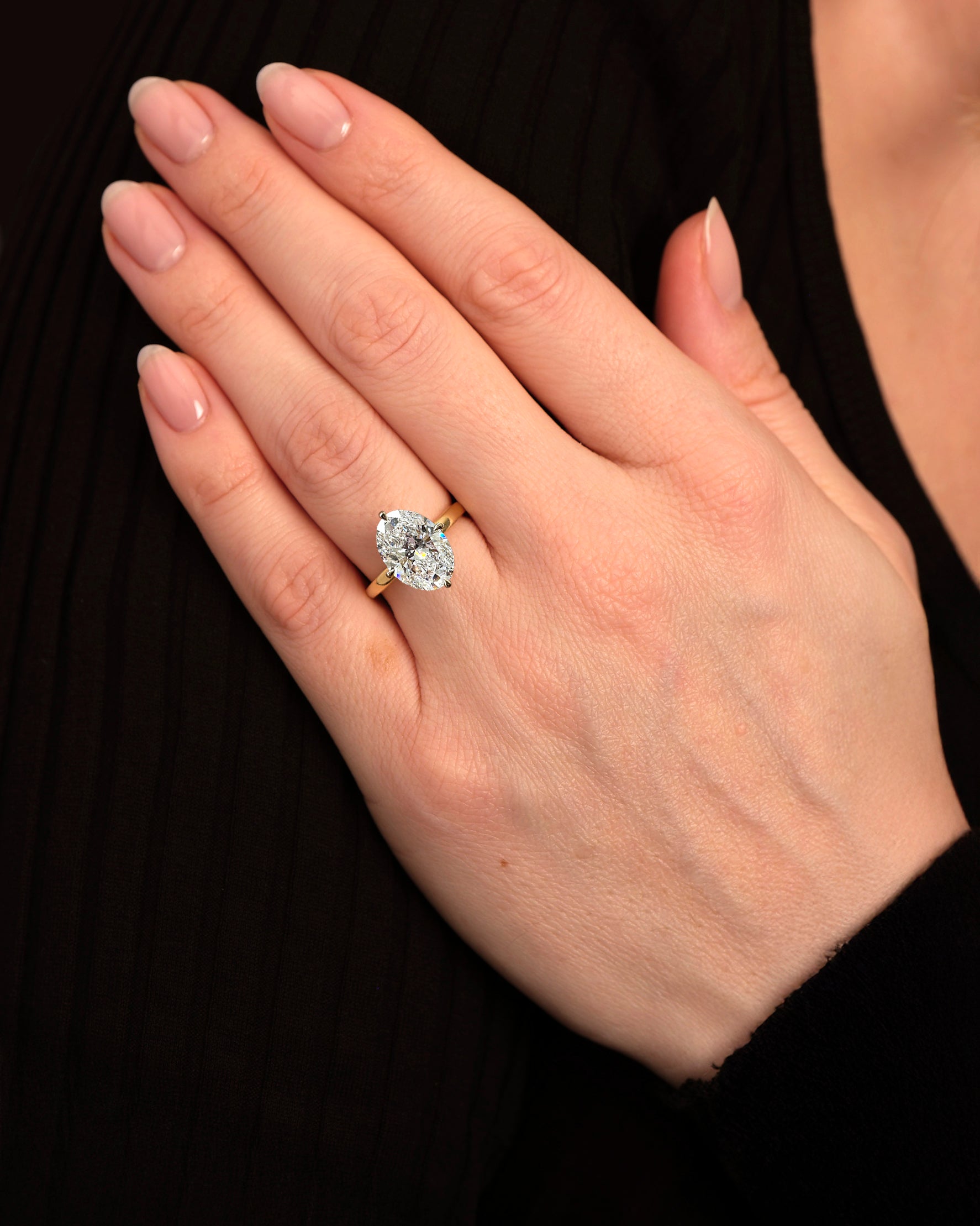 Oval 4ct lab grown diamond solitaire in compass prong setting engagement ring by Layla Diamonds London, 18kt Yellow Gold