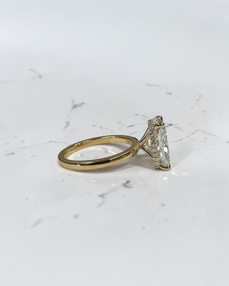 4ct radiant cut lab grown diamond engagement ring with floating setting and wrap around hidden halo 18kt yellow gold