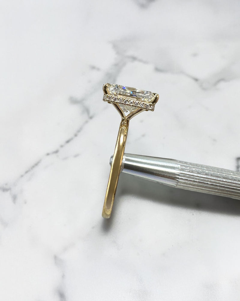 4ct radiant cut lab grown diamond engagement ring with floating setting and wrap around hidden halo 18kt yellow gold