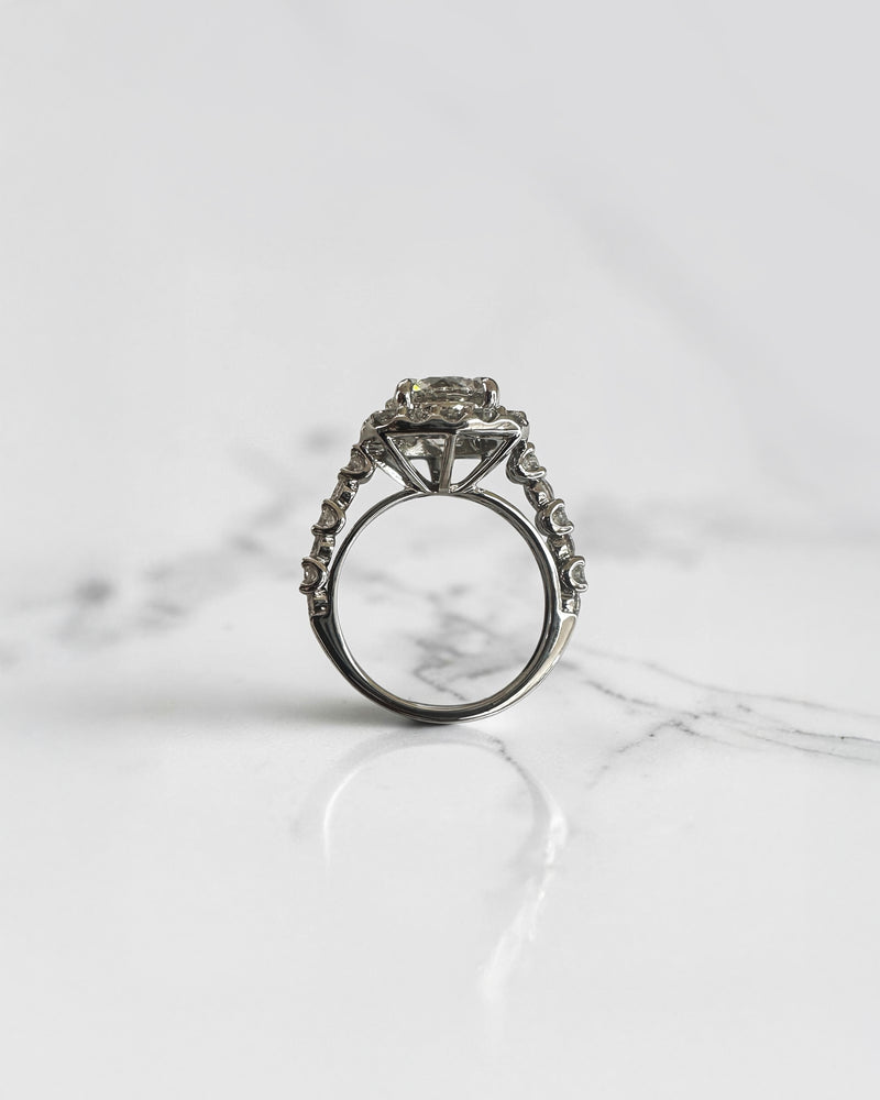 3ct round halo lab grown diamond engagement ring with diamond halo, fancy diamond shoulders and 4ct total diamond weight in 9ct yellow or white gold.