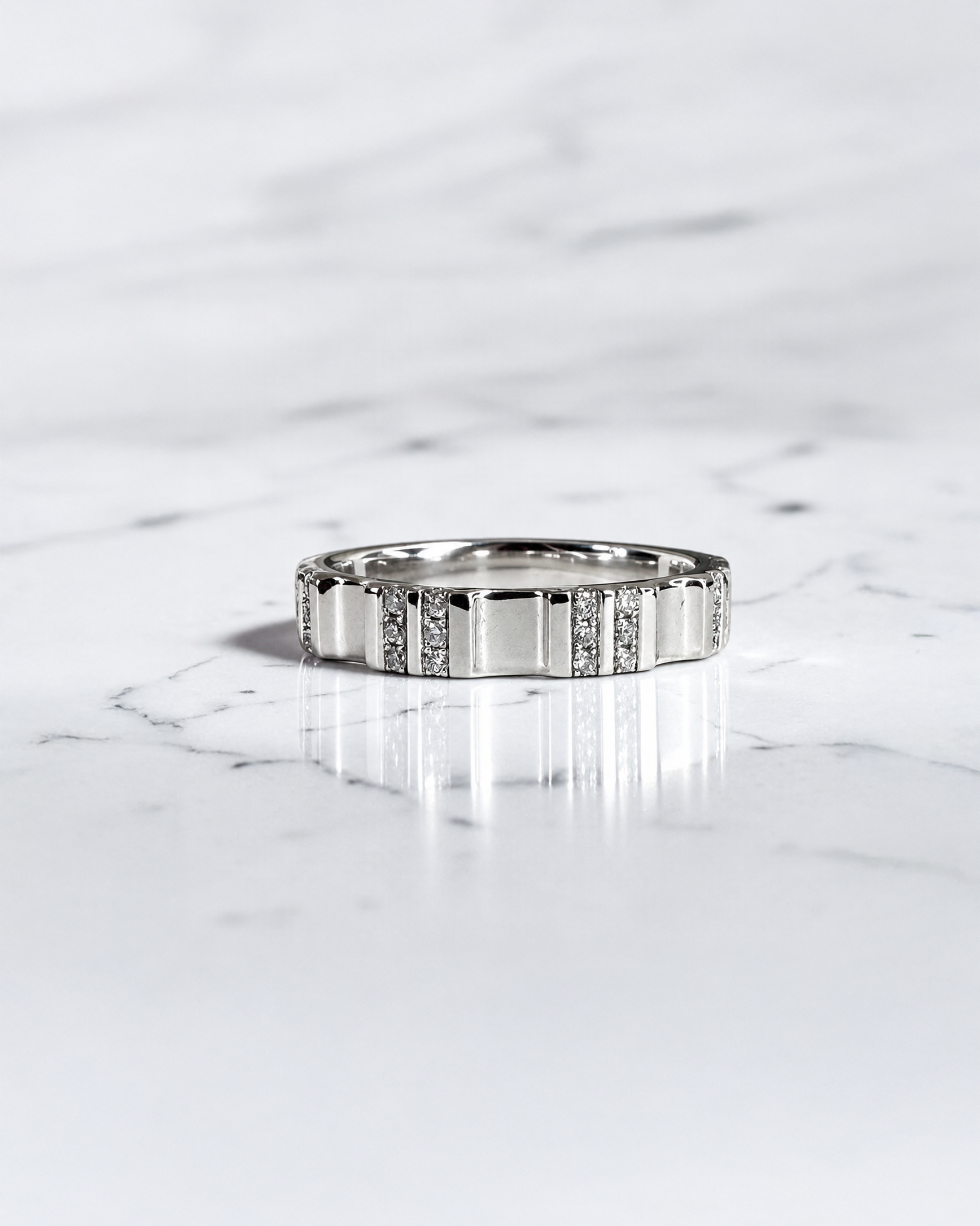 4mm fluted diamond wedding band with 0.17ct round brilliant diamonds in polished gold or platinum.