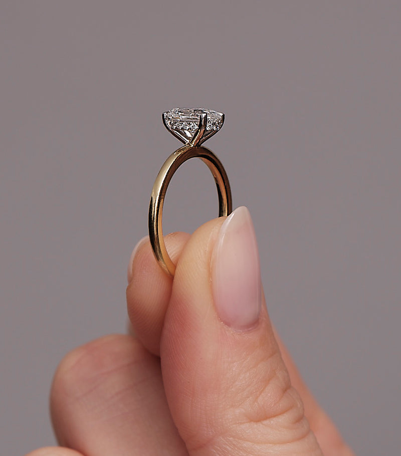 1.25ct oval cut lab grown diamond hidden halo solitaire engagement ring with platinum head by Layla Diamonds.