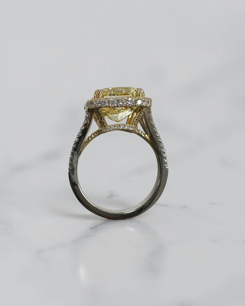5ct square lab grown cushion cut yellow diamond engagement ring with 3D diamond halo and split shoulder band in 18kt yellow and white gold.