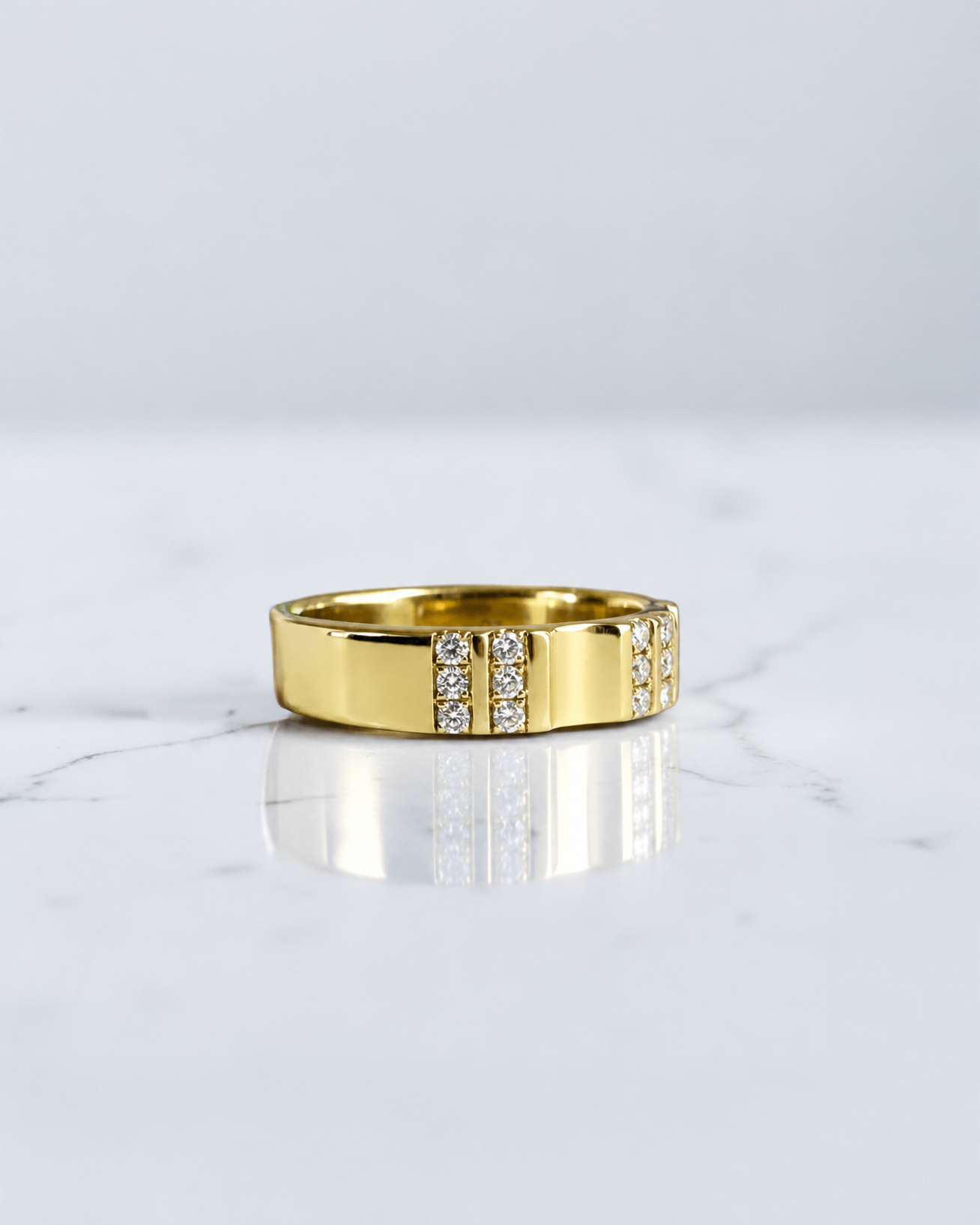 5mm fluted diamond wedding band with 0.30ct round brilliant diamonds in polished gold or platinum.
