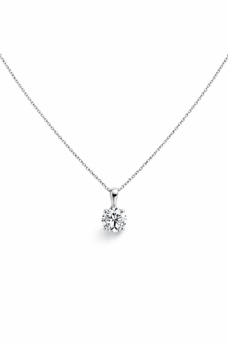Timeless 1ct round brilliant cut diamond pendant with an adjustable 16–18 inch gold chain. Crafted in 9kt or 18kt yellow or white gold. 