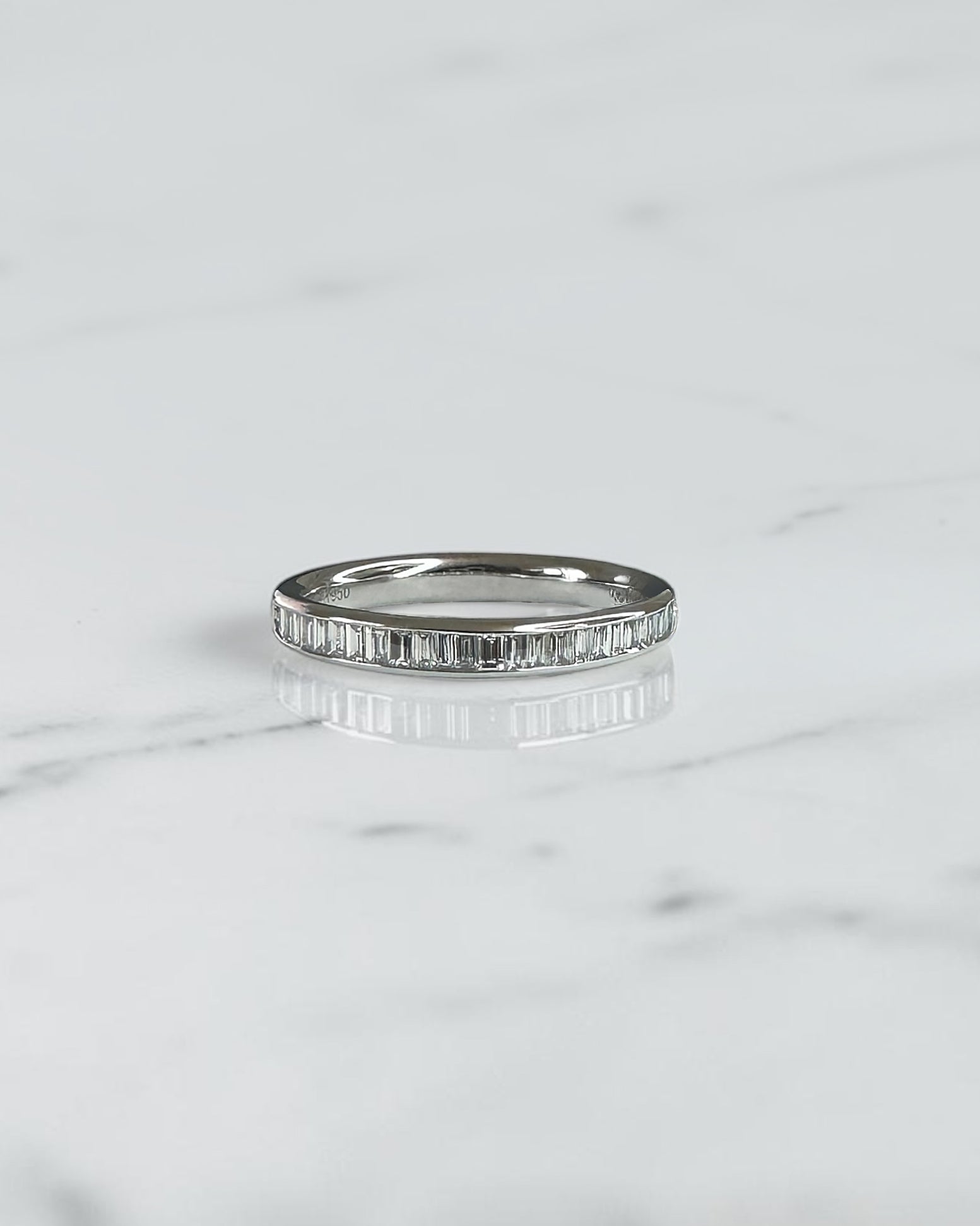 Channel set baguette diamond wedding band with half set baguette diamonds, 2.7mm band, available in 18ct yellow gold, white gold or platinum with lab grown or natural diamonds.