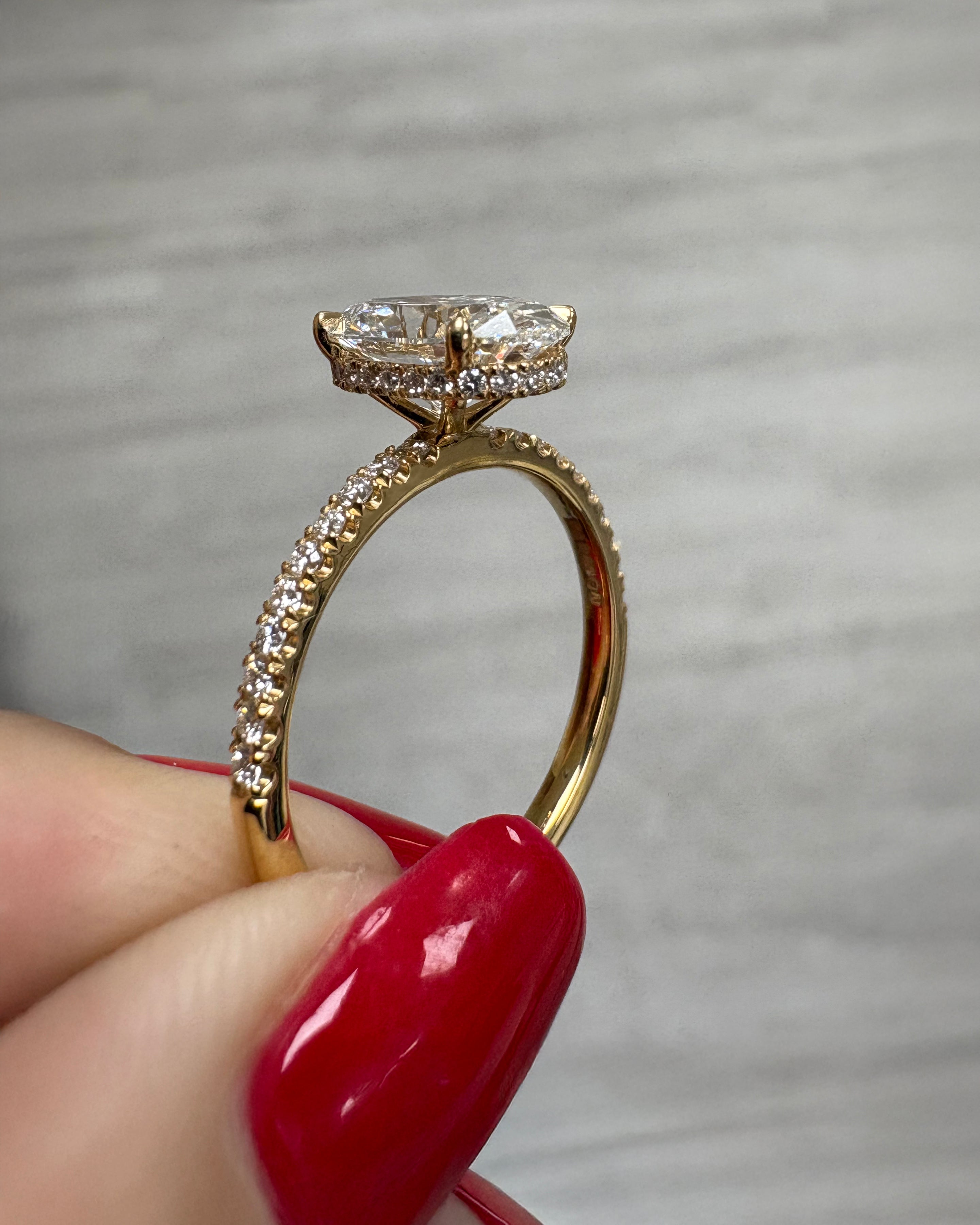 2ct lab grown oval cut diamond hidden halo shoulder band, 18kt yellow gold 