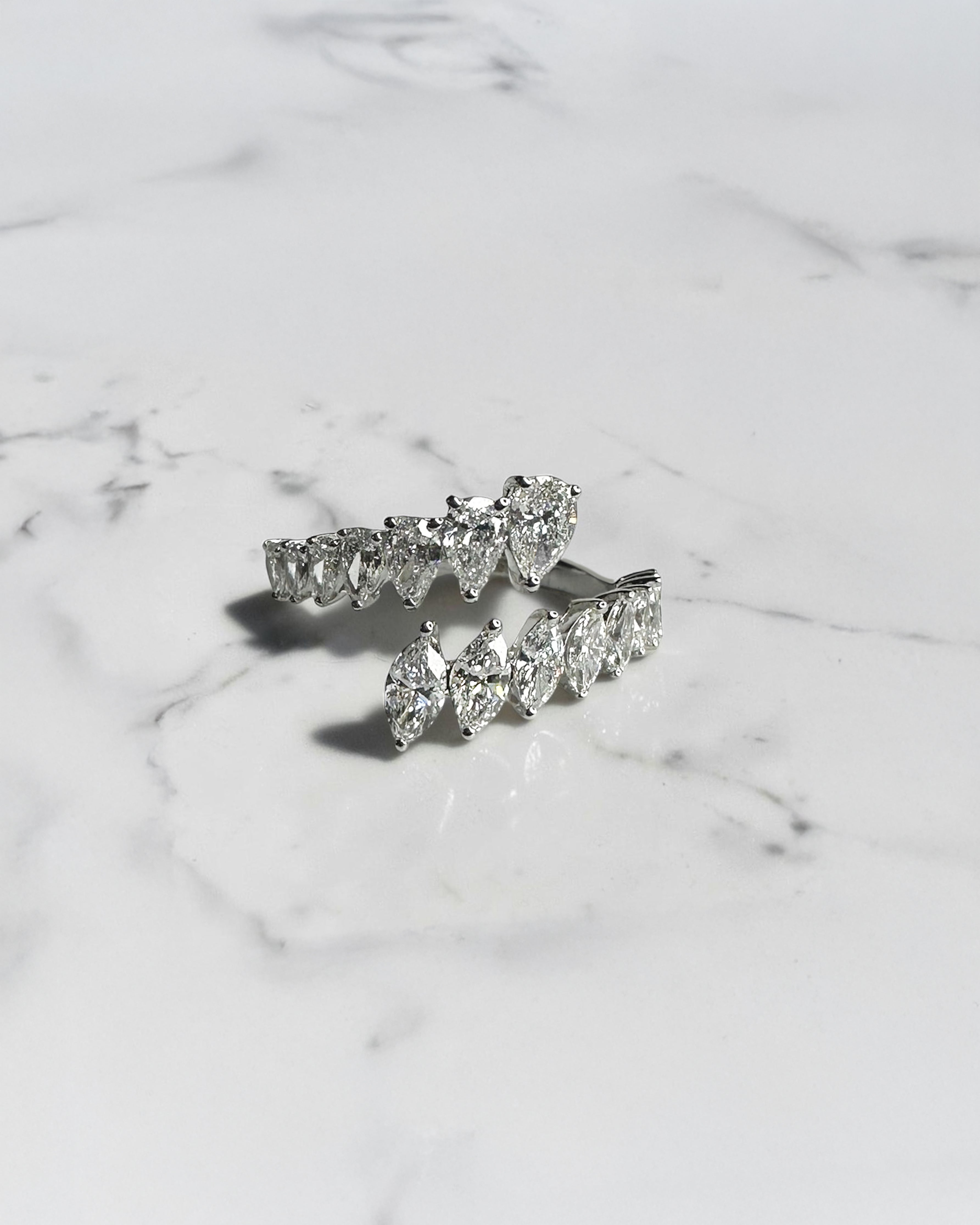 Marquise and Pear cut wrap diamond dress ring featuring approximately 1.75ct marquise and pear cut diamonds in an open wrap design. Available in lab or natural diamonds.