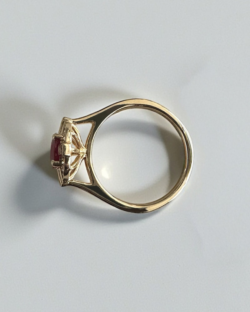 Vintage geometric style natural Ruby oval cut and mined diamond halo engagement ring, 18kt yellow gold