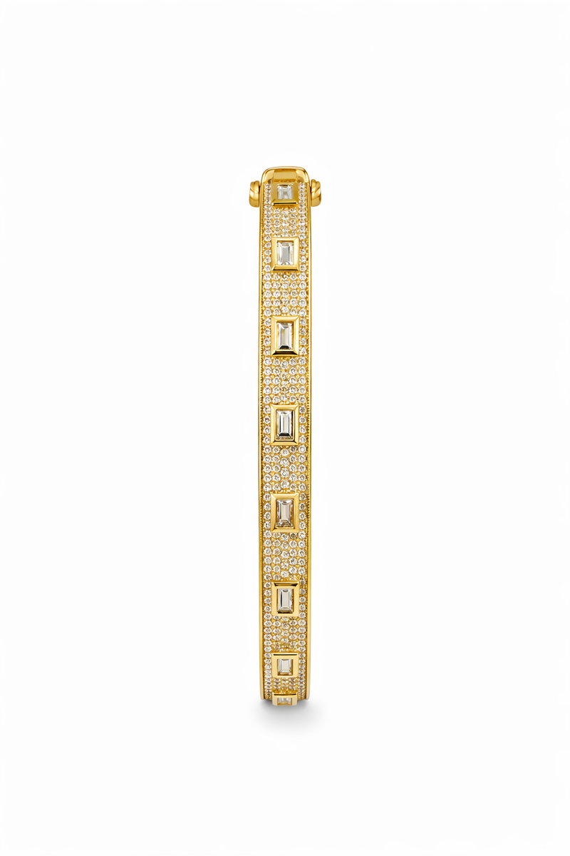Diamond bangle in yellow gold with baguette and round brilliant cut diamonds