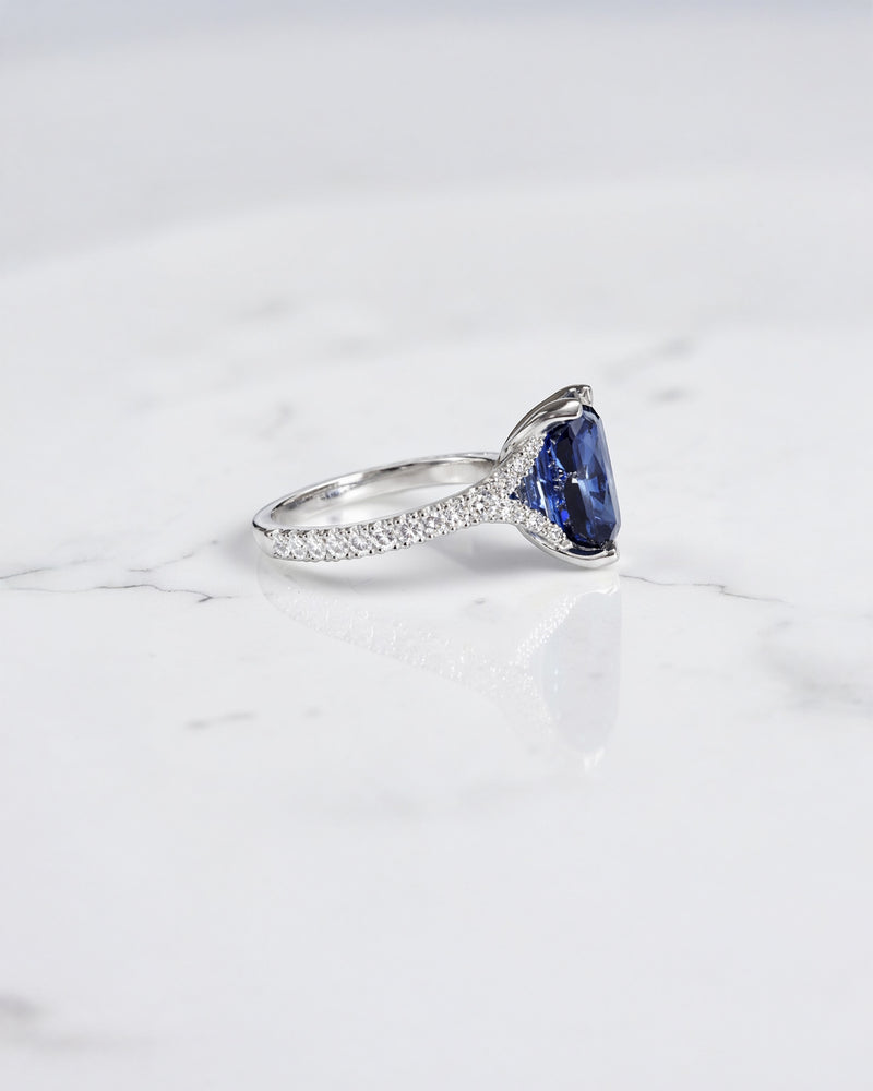 5.80ct elongated cushion cut blue lab grown sapphire engagement ring with diamond split shoulders. platinum or 18kt white gold, made in London
