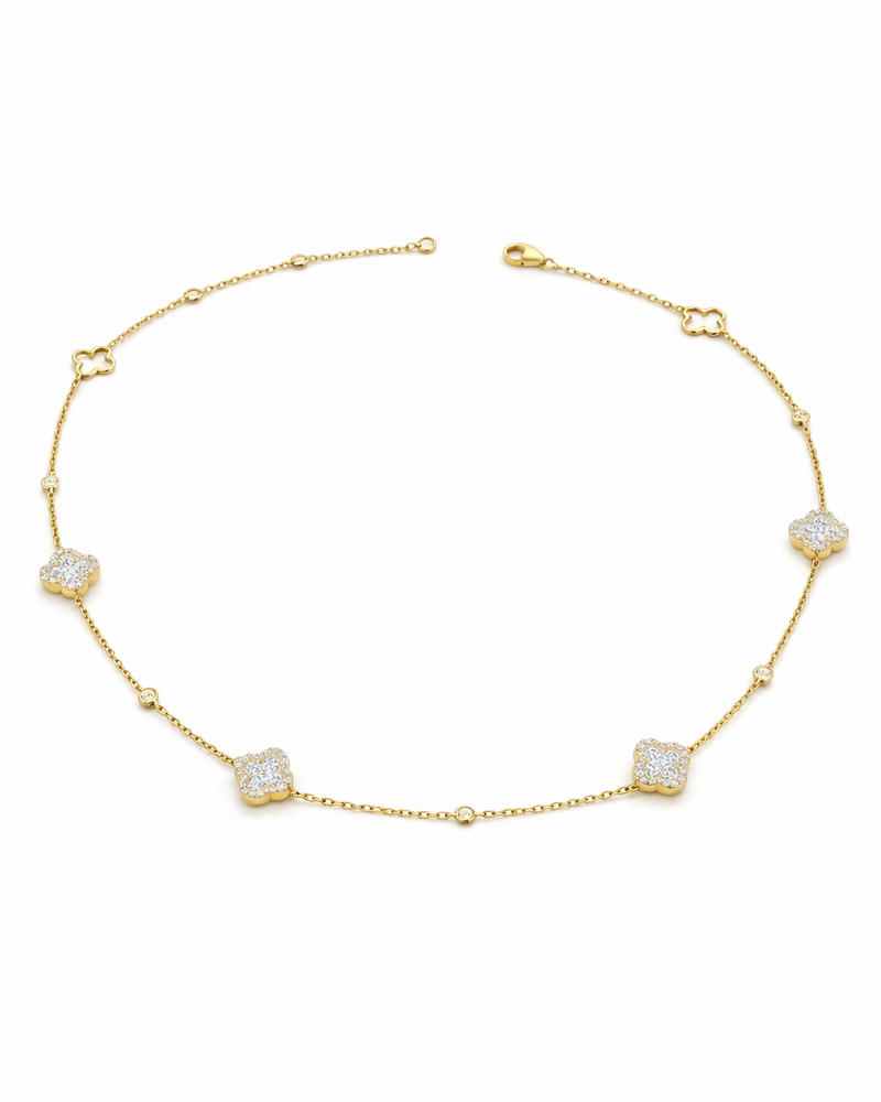 Diamond clover motif necklace in yellow gold featuring 1.40ct diamonds on a delicate adjustable chain
