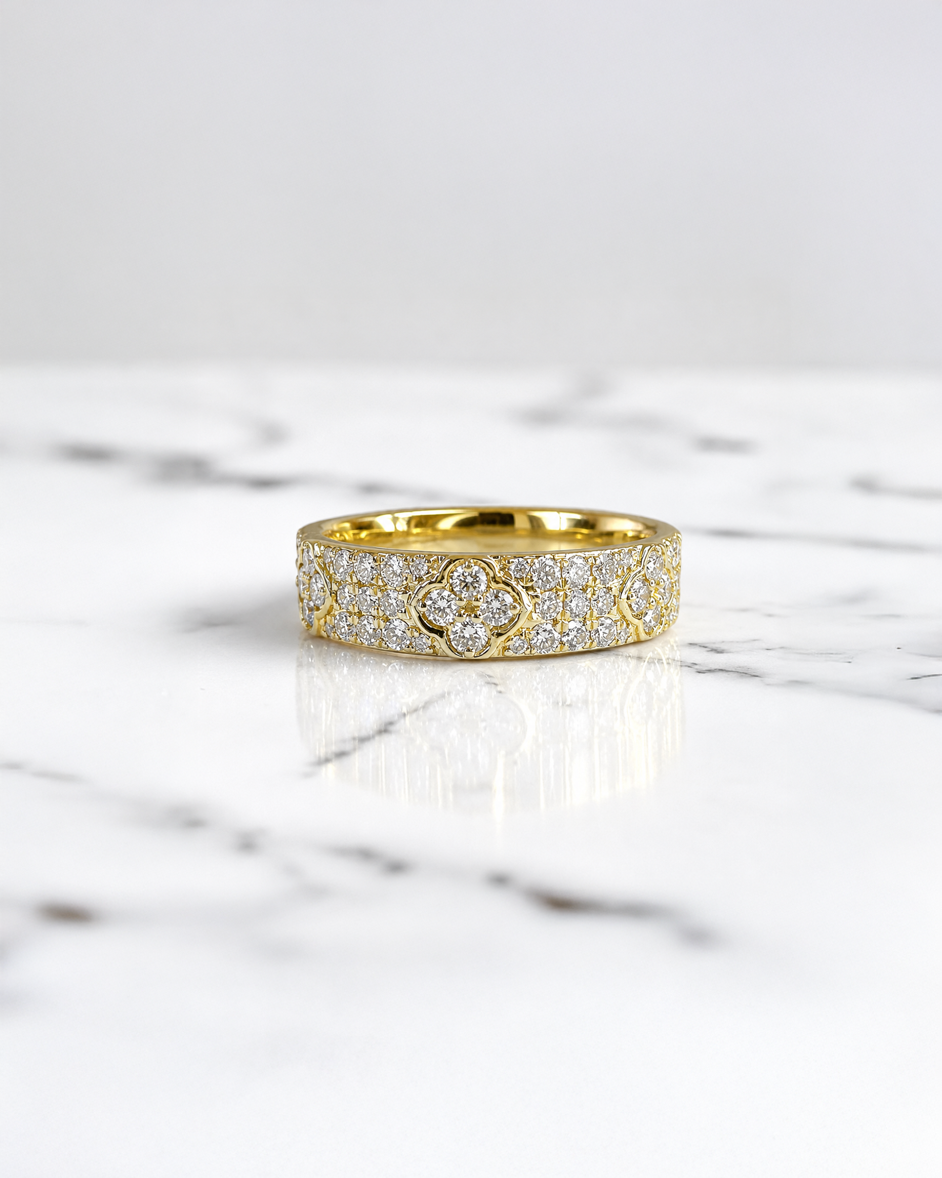 Diamond 4 Leaf Clover band with 0.50ct diamonds in yellow gold, featuring a 4.8mm half set diamond band with an elegant clover design.