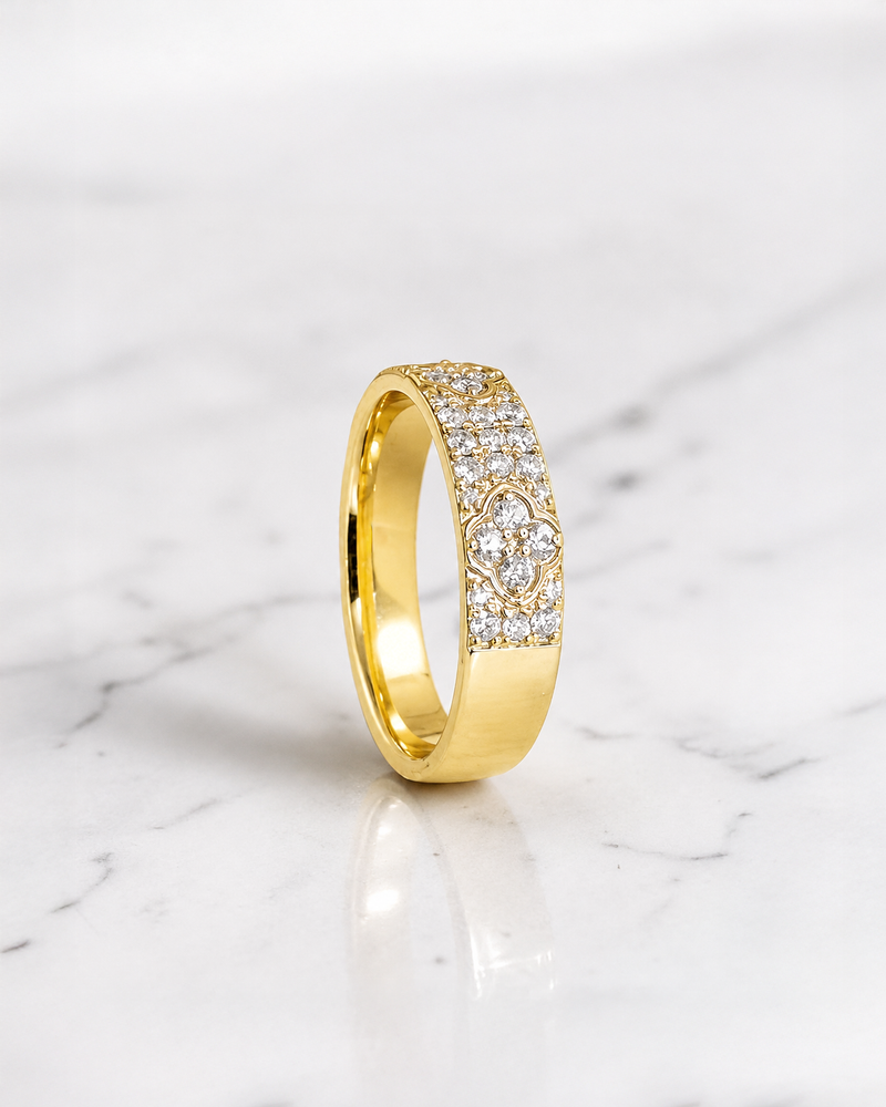 Diamond 4 Leaf Clover band with 0.50ct diamonds in yellow gold, featuring a 4.8mm half set diamond band with an elegant clover design.