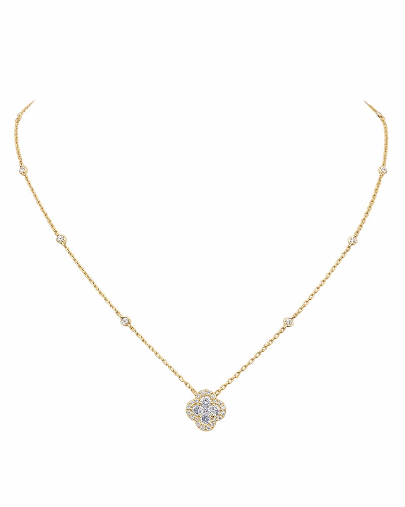 Diamond clover pendant necklace in yellow gold featuring a 0.70ct diamond clover motif on an 18 inch fine chain