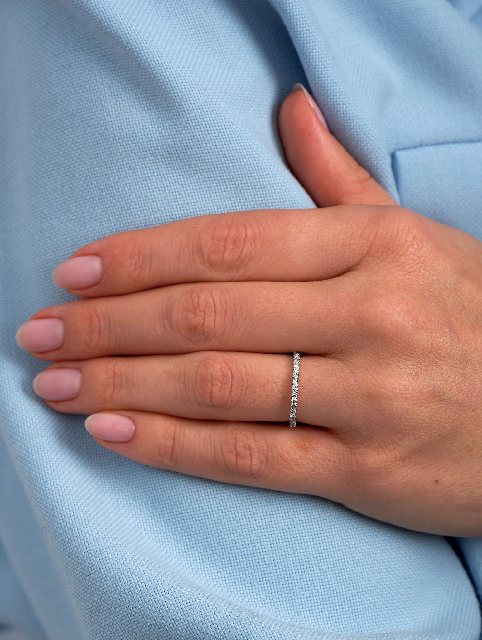 Side profile of 0.17ct diamond engagement bands showing the half eternity setting.