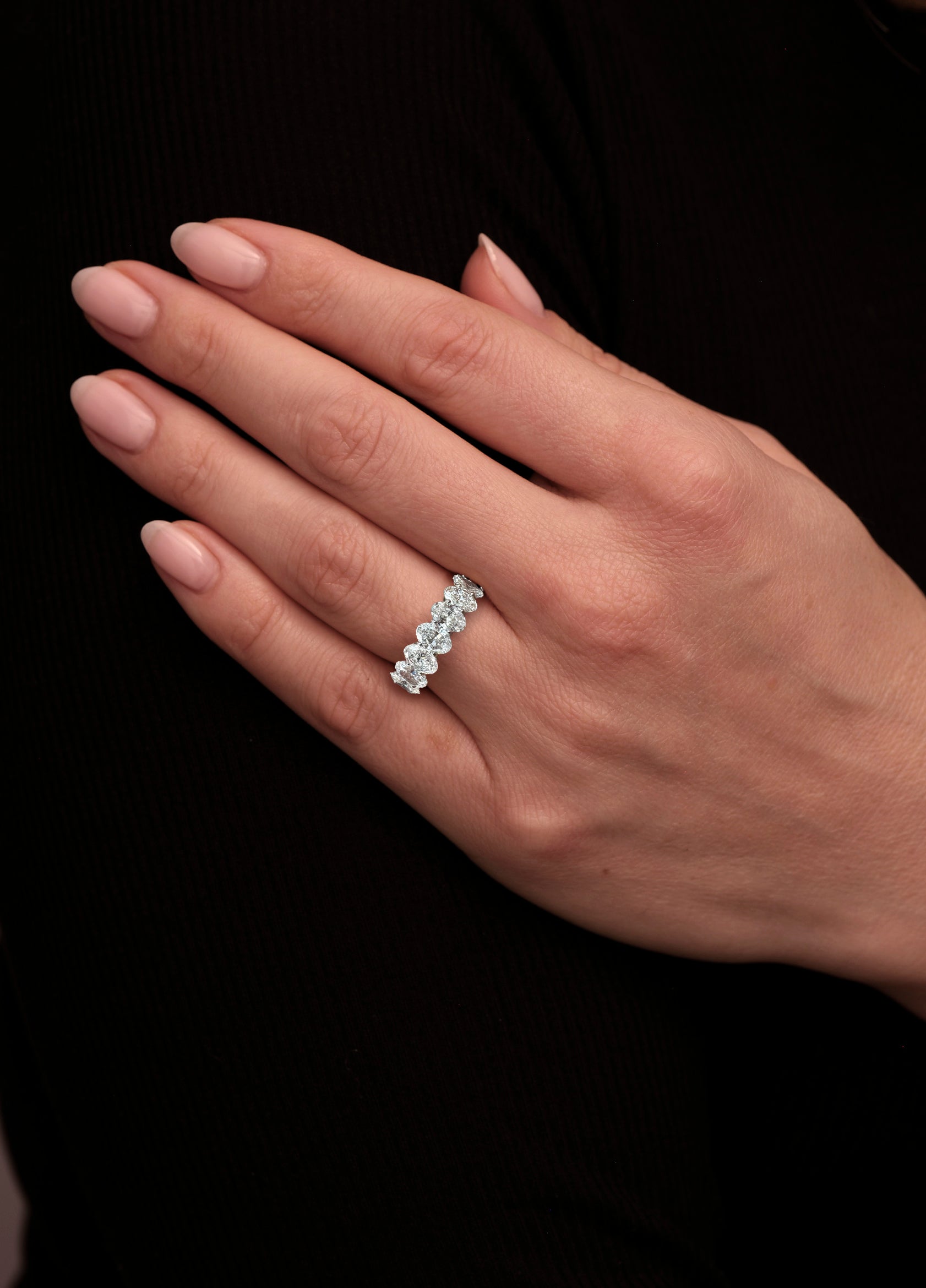 A stunning 3ct oval diamond eternity band from our diamond engagement rings for women collection.
