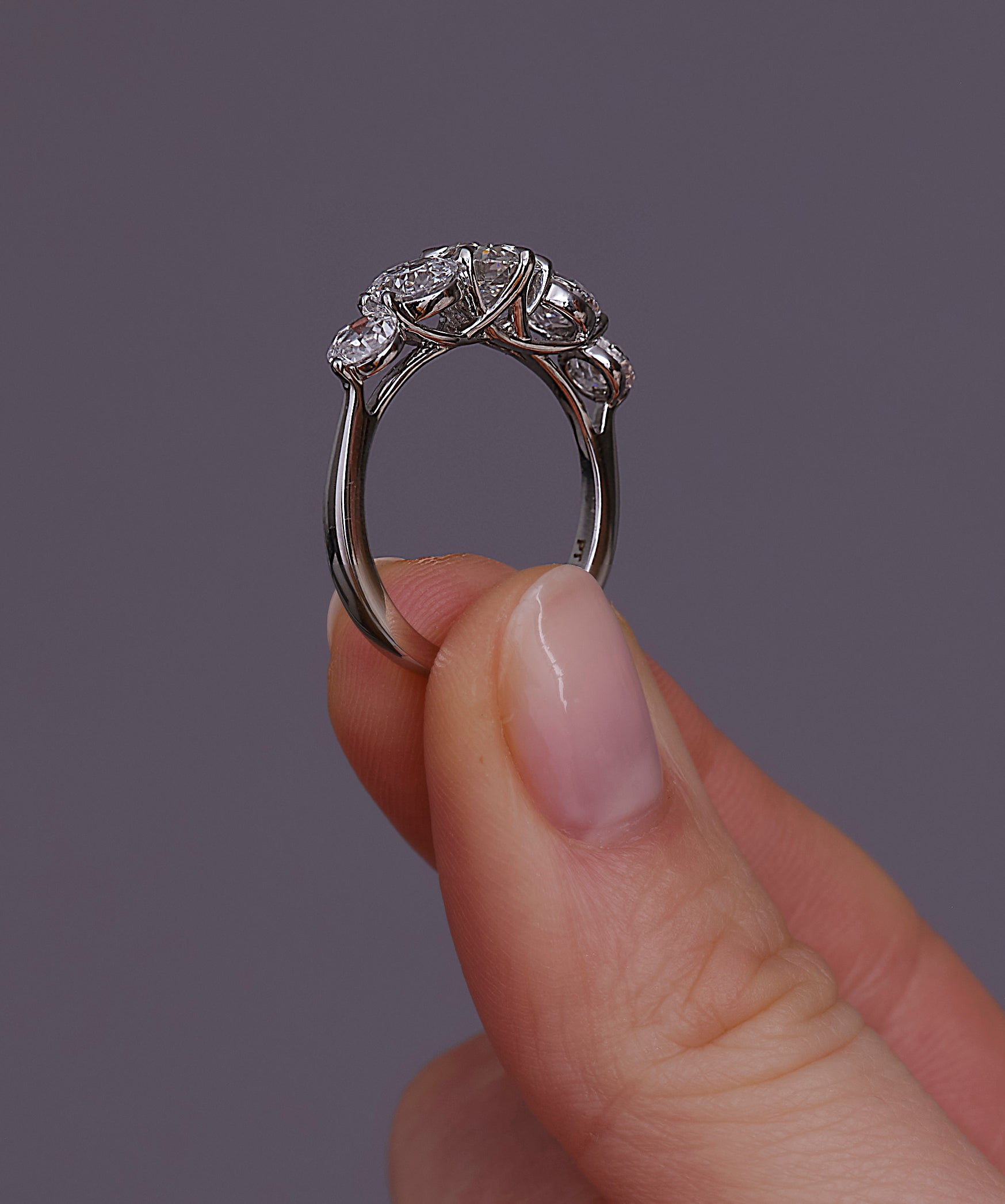 Side profile of the 3ct graduated diamond ring, part of our diamond rings for women range.
