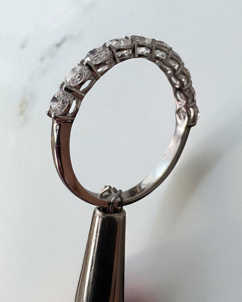 Perspective view of a high-quality 1ct round diamond ring for diamond wedding bands bridal sets.
