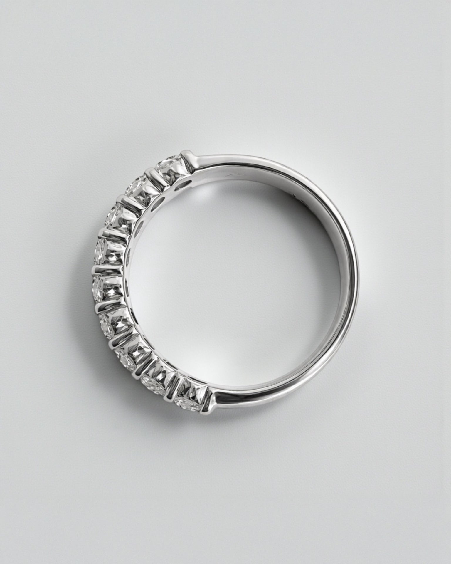 top view of double row diamond eternity ring with round brilliant diamonds arranged in a continuous double row. 9kt or 18kt white or yellow gold or platinum