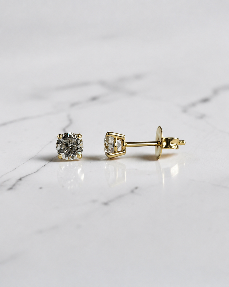 0.70ct round brilliant lab grown diamond stud earrings in a classic four prong setting handcrafted by Layla Diamonds