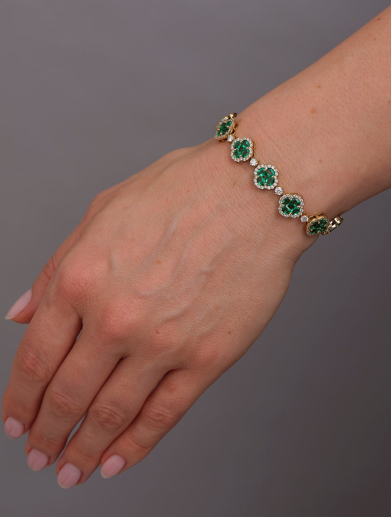 Diamond & Emerald Clover Bracelet featuring 3.50ct F VS2+ diamonds and 10ct emeralds, handcrafted in London by Layla Diamonds UK lab grown diamonds mined diamonds natural  on hand, wrist, arm
