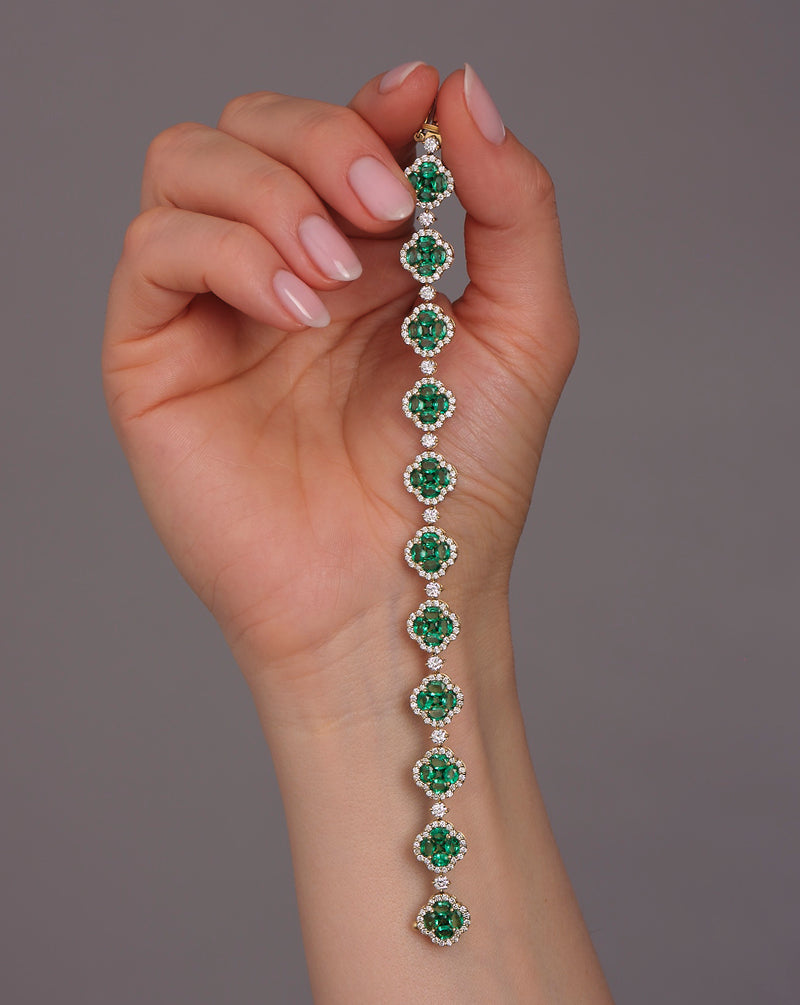 Diamond & Emerald Clover Bracelet featuring 3.50ct F VS2+ diamonds and 10ct emeralds, handcrafted in London by Layla Diamonds UK lab grown diamonds mined diamonds natural  on hand, wrist, arm