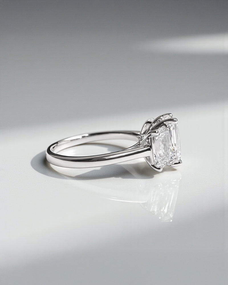 Emerald cut diamond trilogy engagement ring with 3ct centre lab grown diamond, total 5ct diamonds platinum or 18kt white gold 