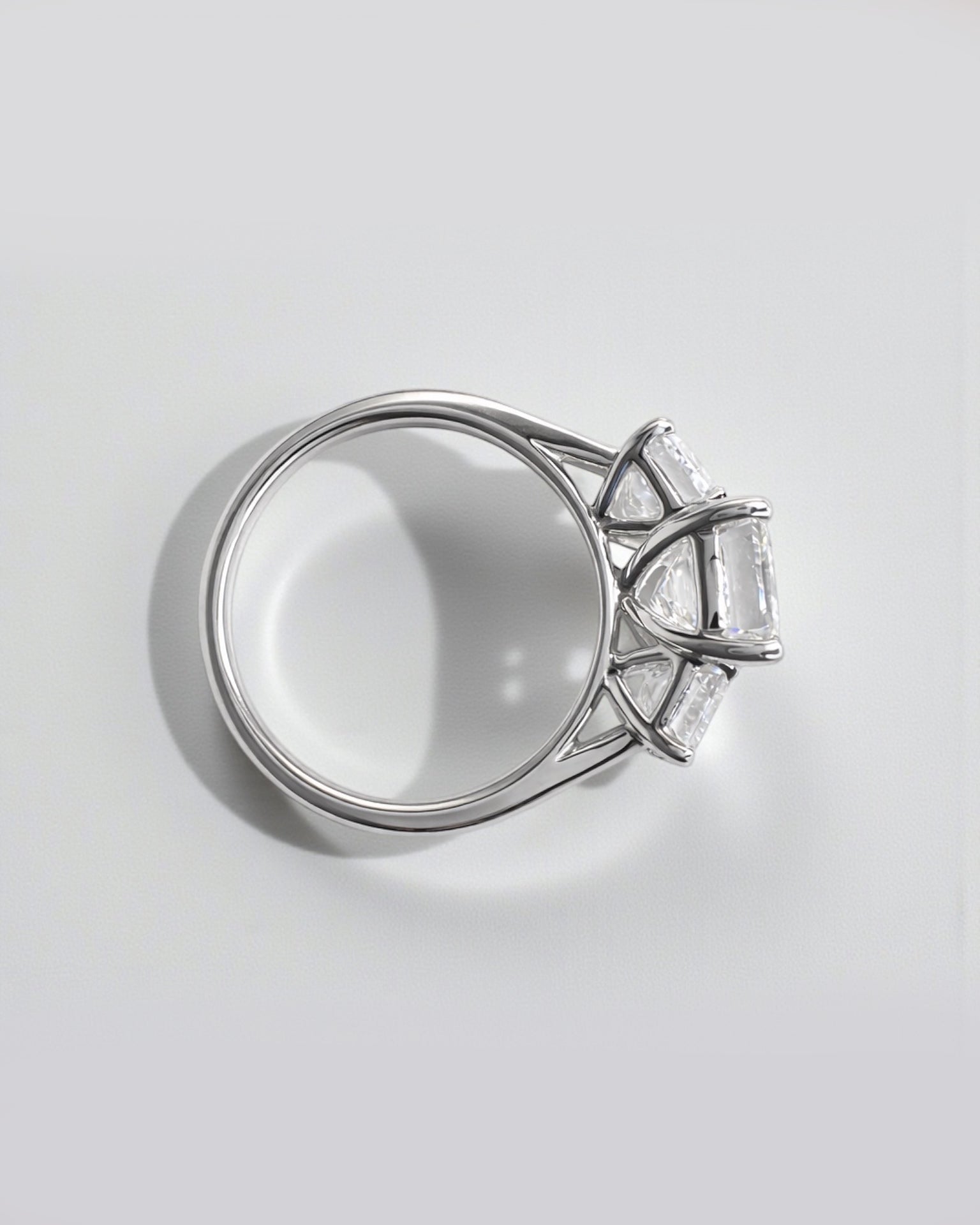 Emerald cut diamond trilogy engagement ring with 3ct centre lab grown diamond, total 5ct diamonds platinum or 18kt white gold 