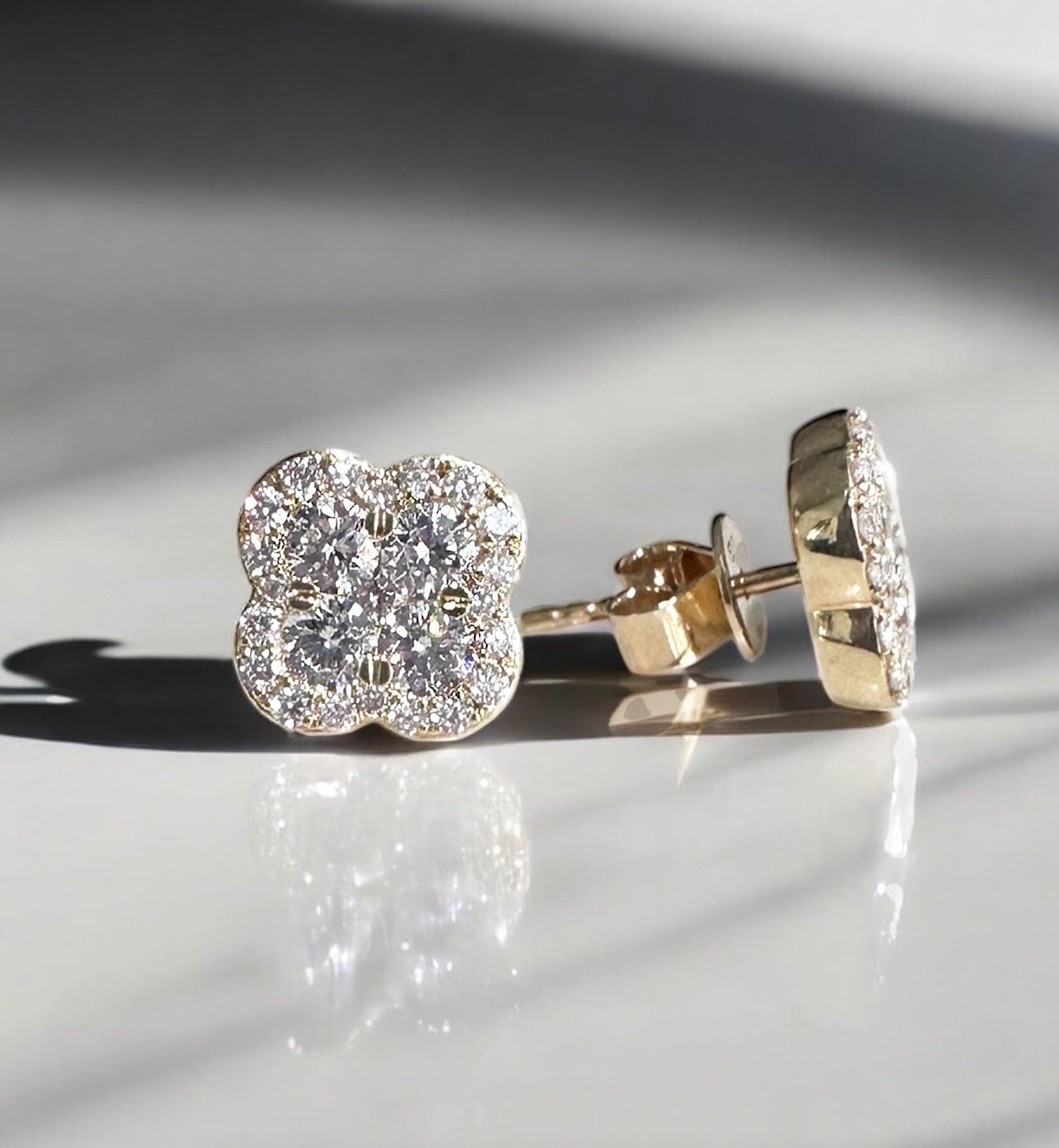 Grande Four Leaf Clover Diamond Stud Earrings on ear