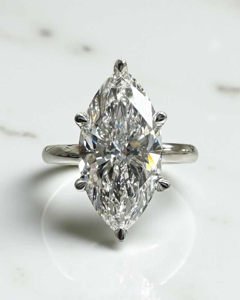 3.50ct marquise diamond ring with a lab grown diamond and hidden halo.