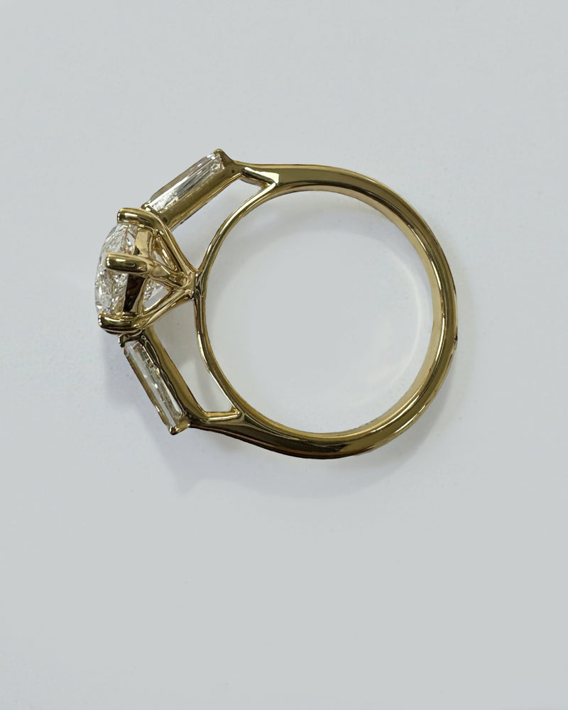 Detailed view of the setting and band of this 3ct marquise diamond ring.