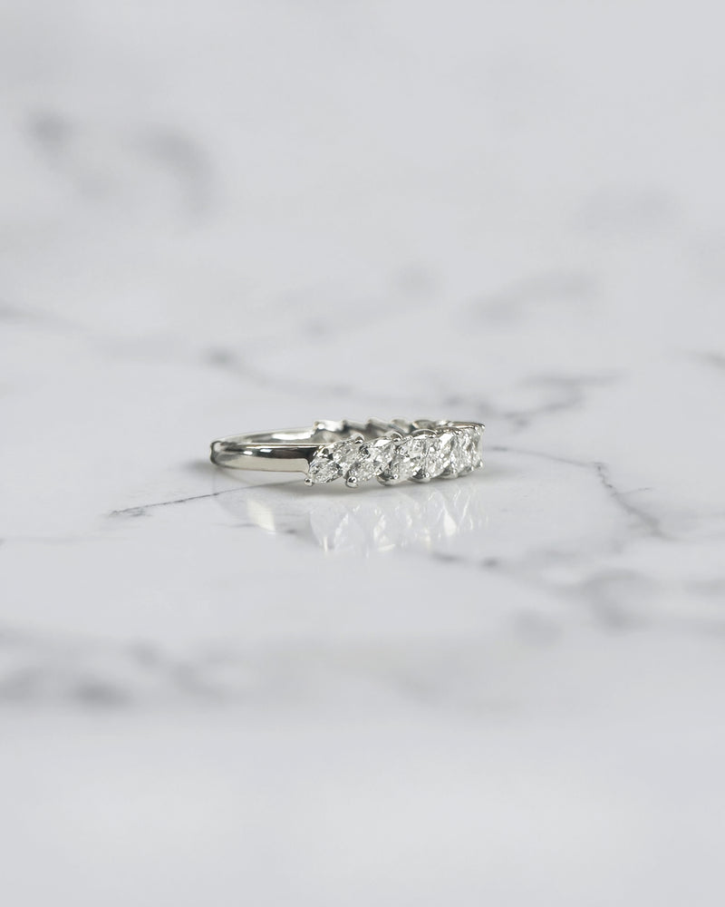 0.90ct slanted marquise cut diamond band with 0.90ct total diamonds in a claw setting, available in platinum or gold with lab grown or natural diamonds.