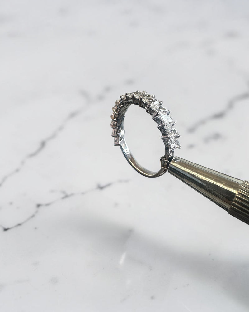 0.90ct slanted marquise cut diamond band with 0.90ct total diamonds in a claw setting, available in platinum or gold with lab grown or natural diamonds.