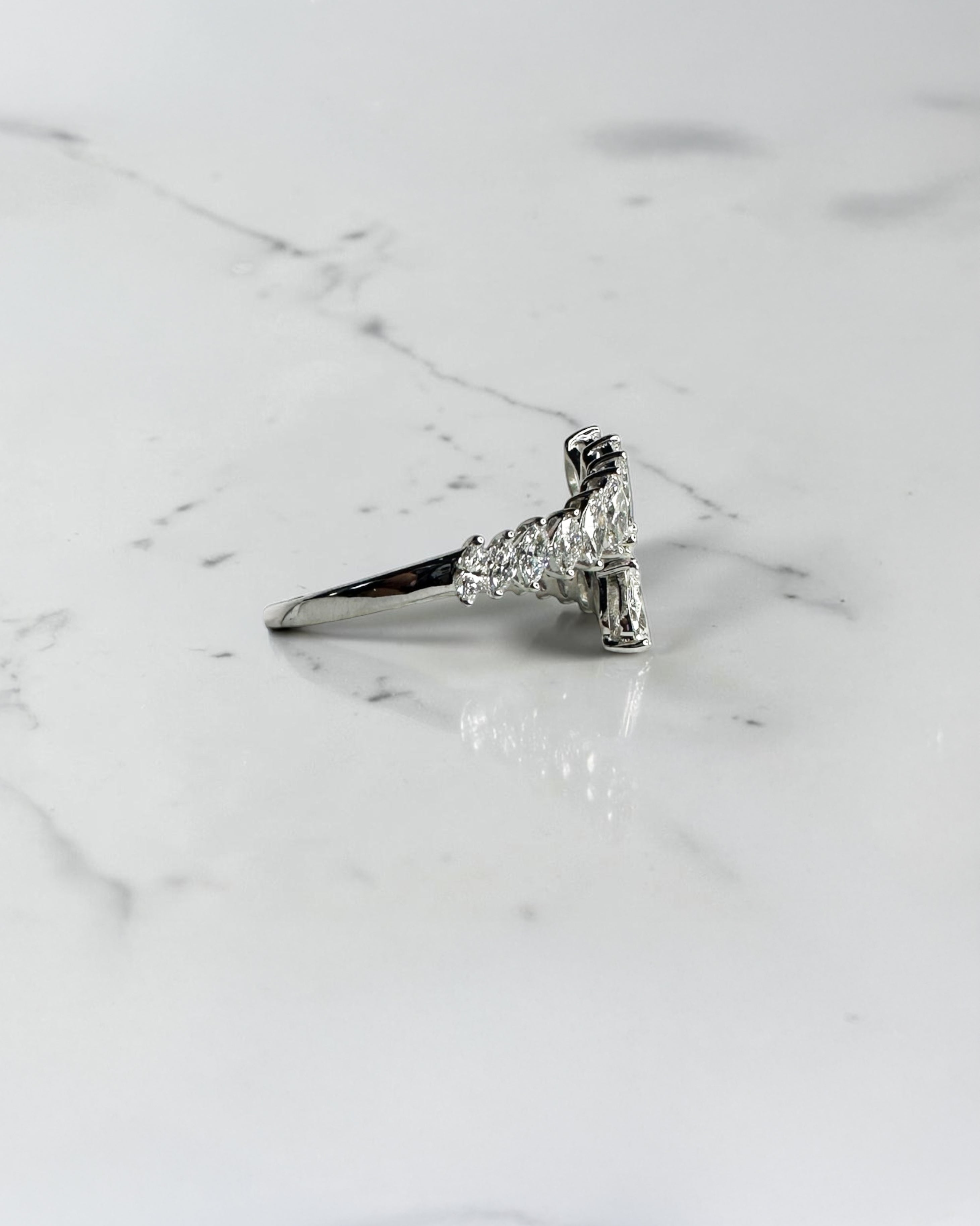 Marquise and Pear cut wrap diamond dress ring featuring approximately 1.75ct marquise and pear cut diamonds in an open wrap design. Available in lab or natural diamonds.