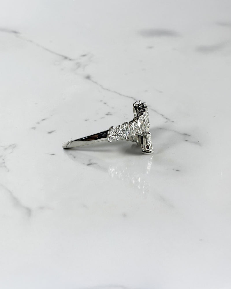 Marquise and Pear cut wrap diamond dress ring featuring approximately 1.75ct marquise and pear cut diamonds in an open wrap design. Available in lab or natural diamonds.
