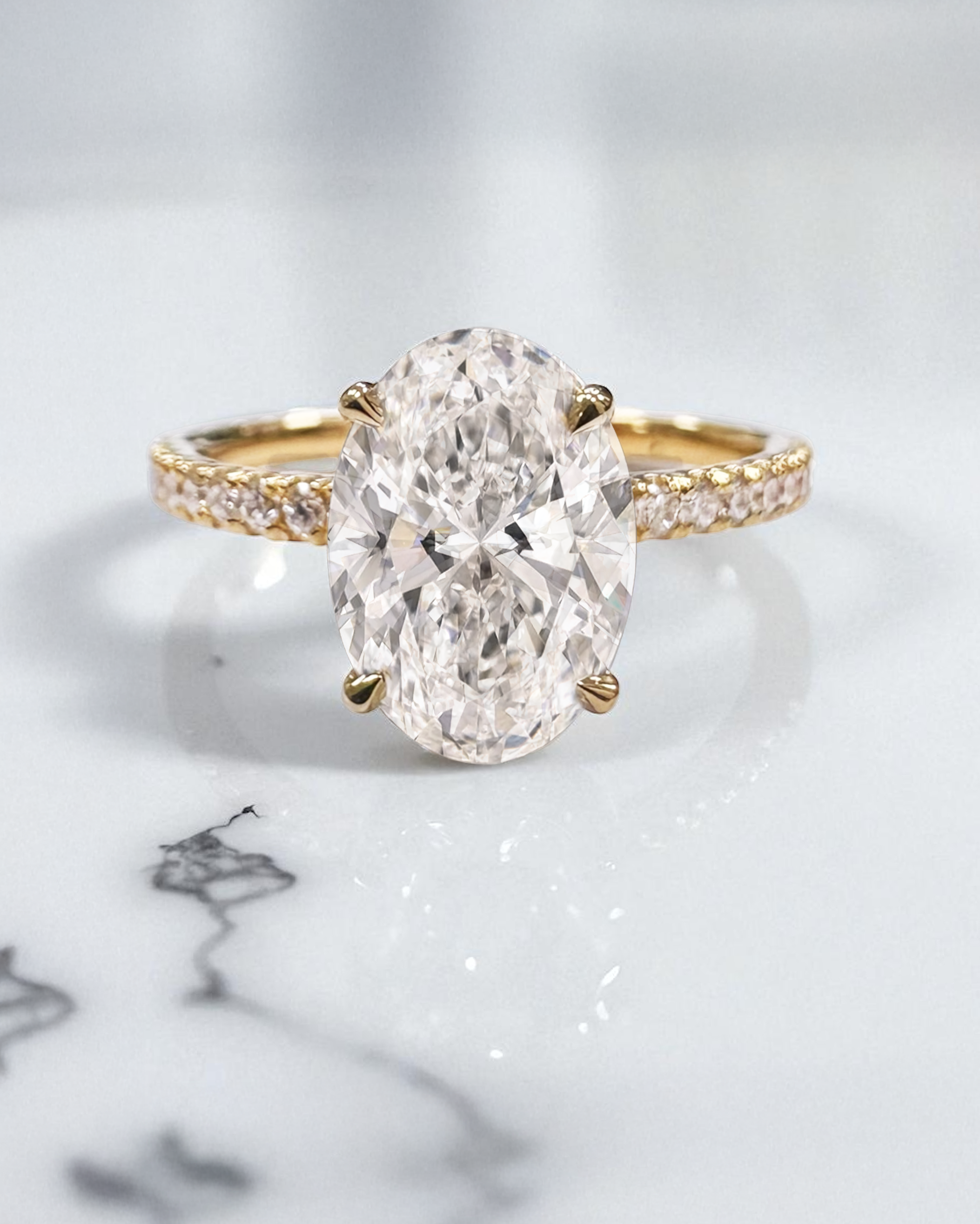 2ct lab grown oval cut diamond hidden halo shoulder band, 18kt yellow gold 