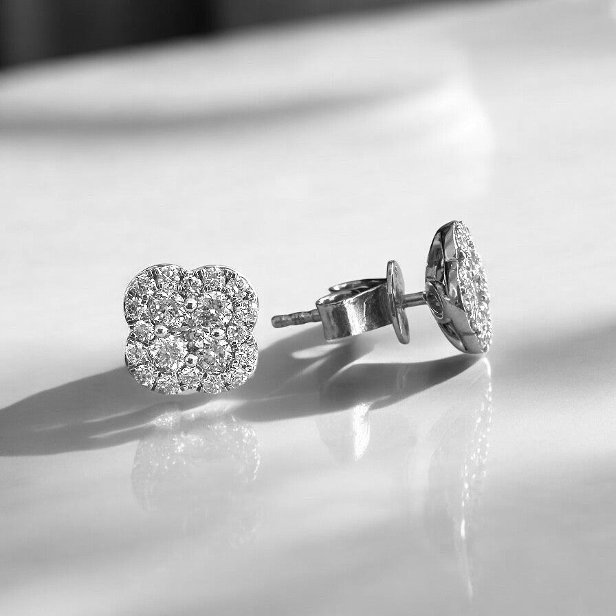 4 leaf clover diamond stud earrings on ear
