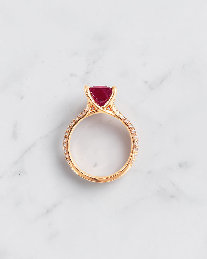 5.80ct elongated cushion cut pink lab grown sapphire engagement ring with diamond shoulders in 18kt rose gold.