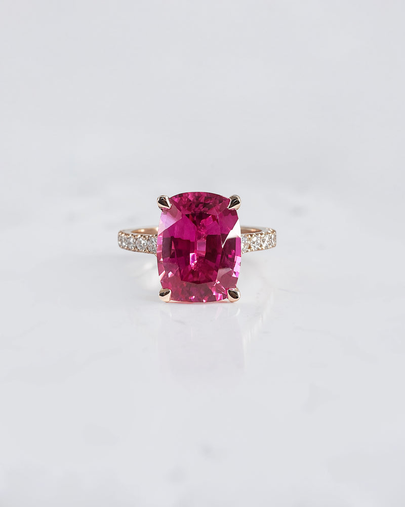 5.80ct elongated cushion cut pink lab grown sapphire engagement ring with diamond shoulders in 18kt rose gold. made in London