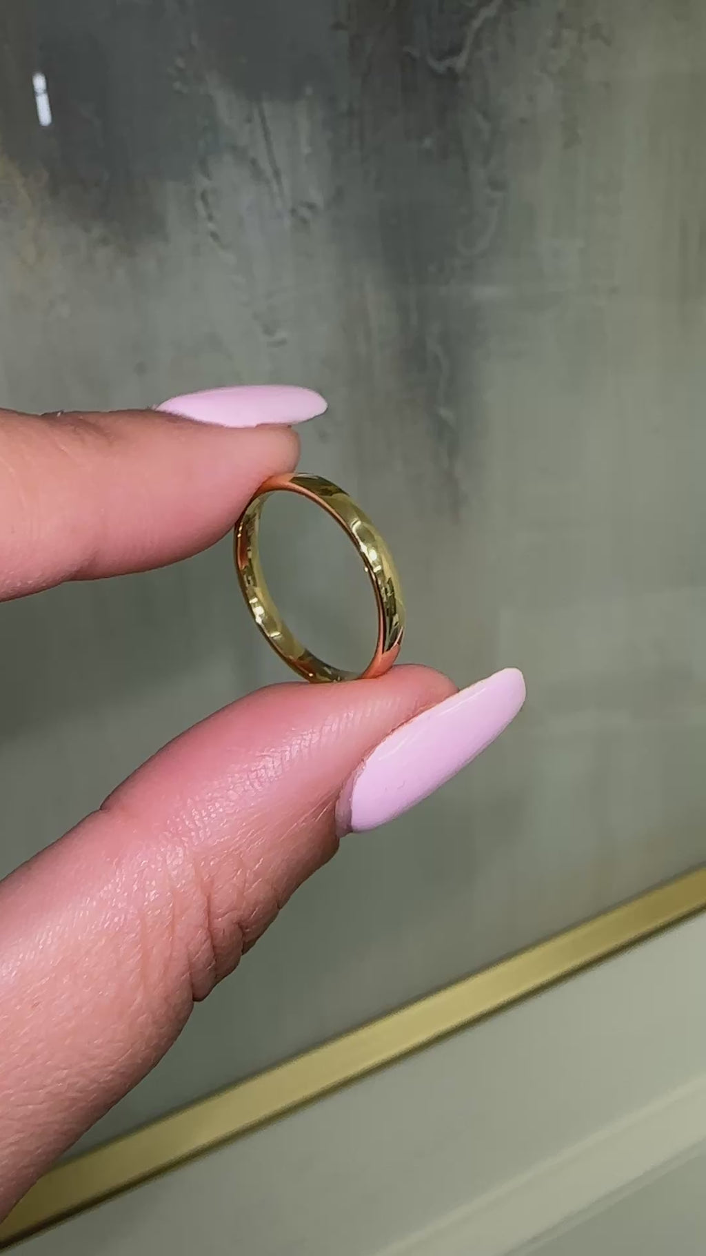 2.5mm Court Wedding Band with a soft comfort fit profile in polished 18ct yellow gold, handcrafted in London.