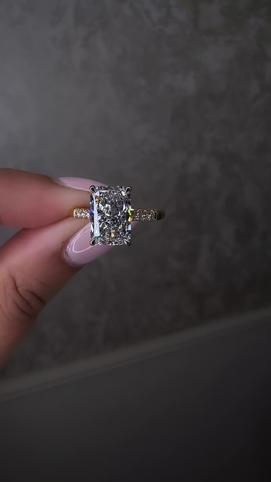 3ct radiant cut lab grown diamond engagement ring with partial pavé band, cathedral setting, hidden halo and two tone yellow gold band